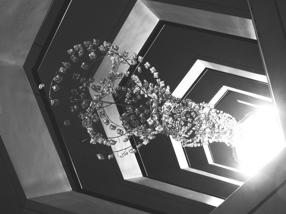 Architectural detail of an elegant hotel lobby chandelier